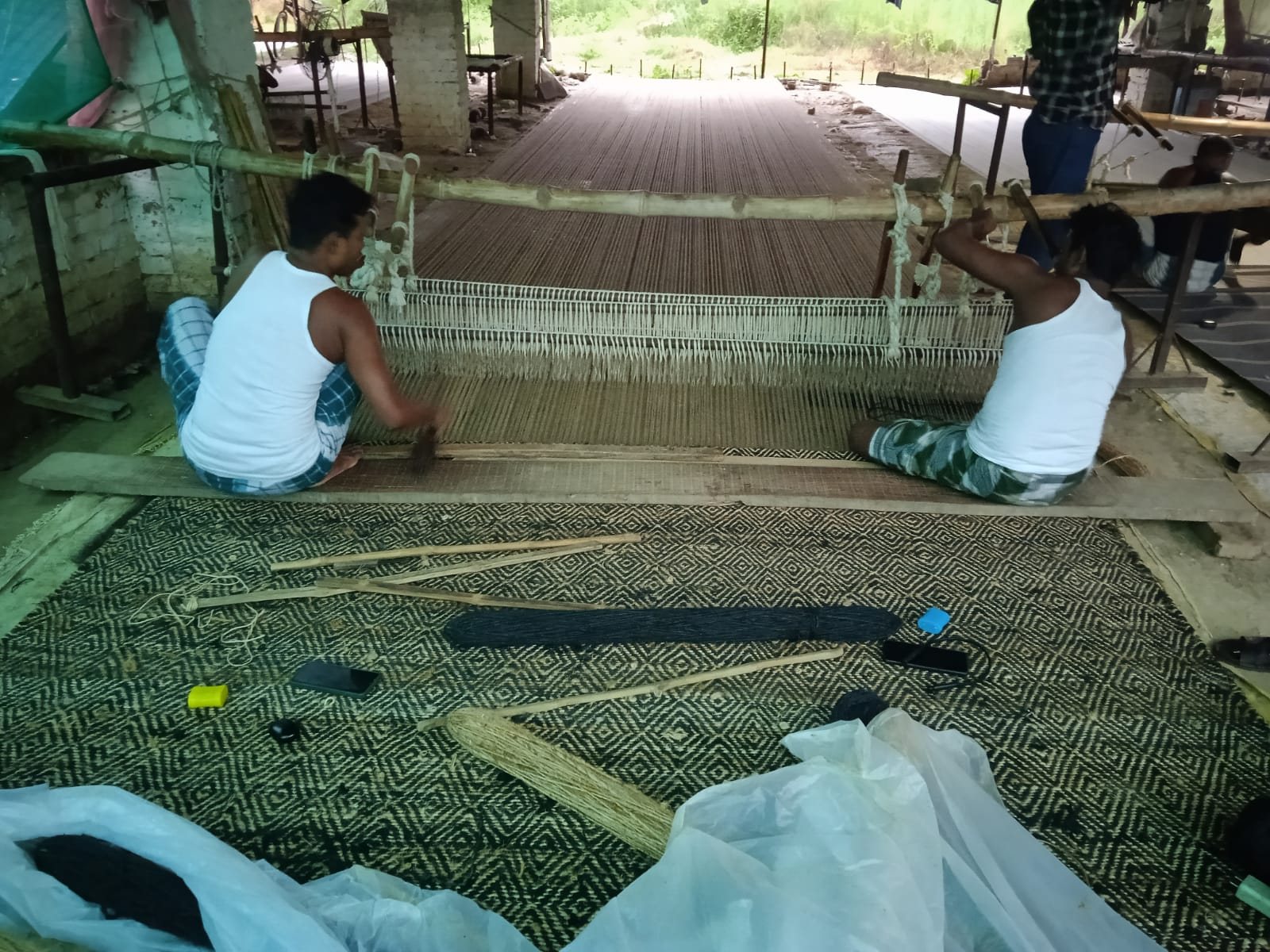Weavers at the loom